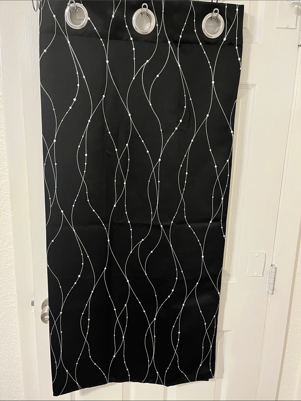 Black Grommet Curtain Panel with Silver Swirl design